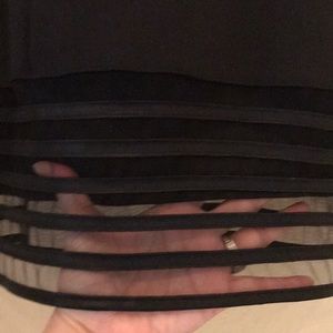 Sleeveless little black dress.